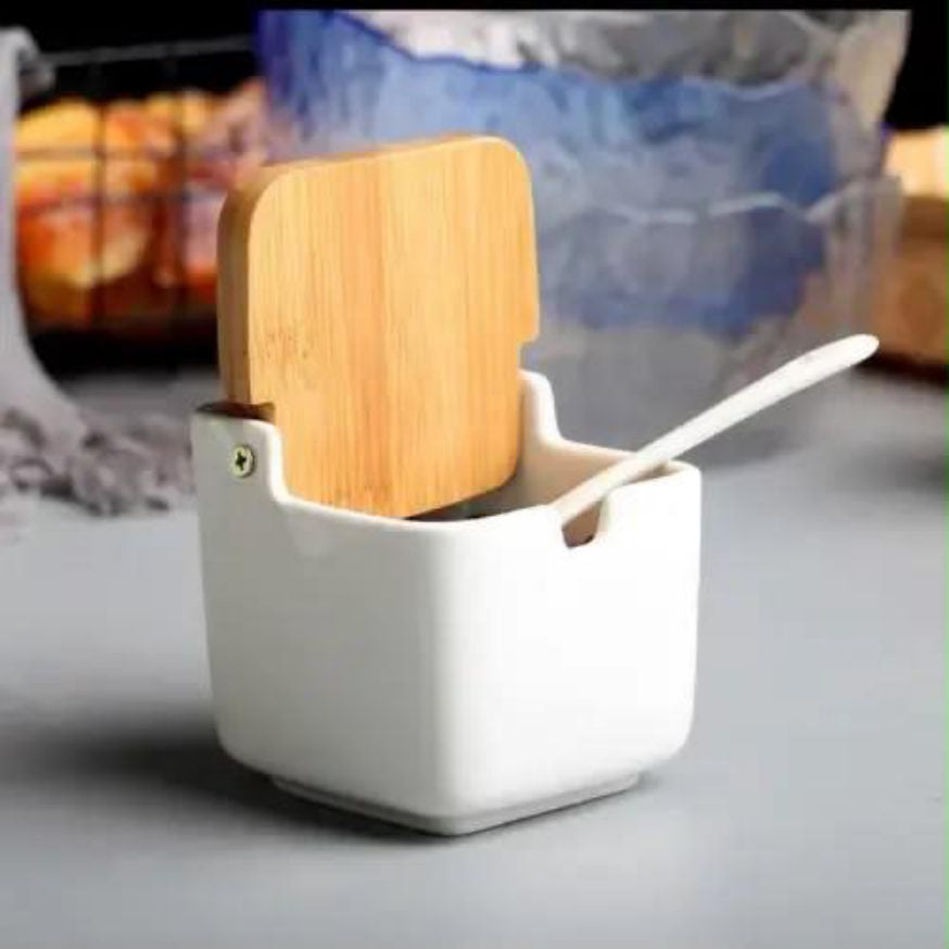 Salsera de cerámica con tapa de bambú y cuchara